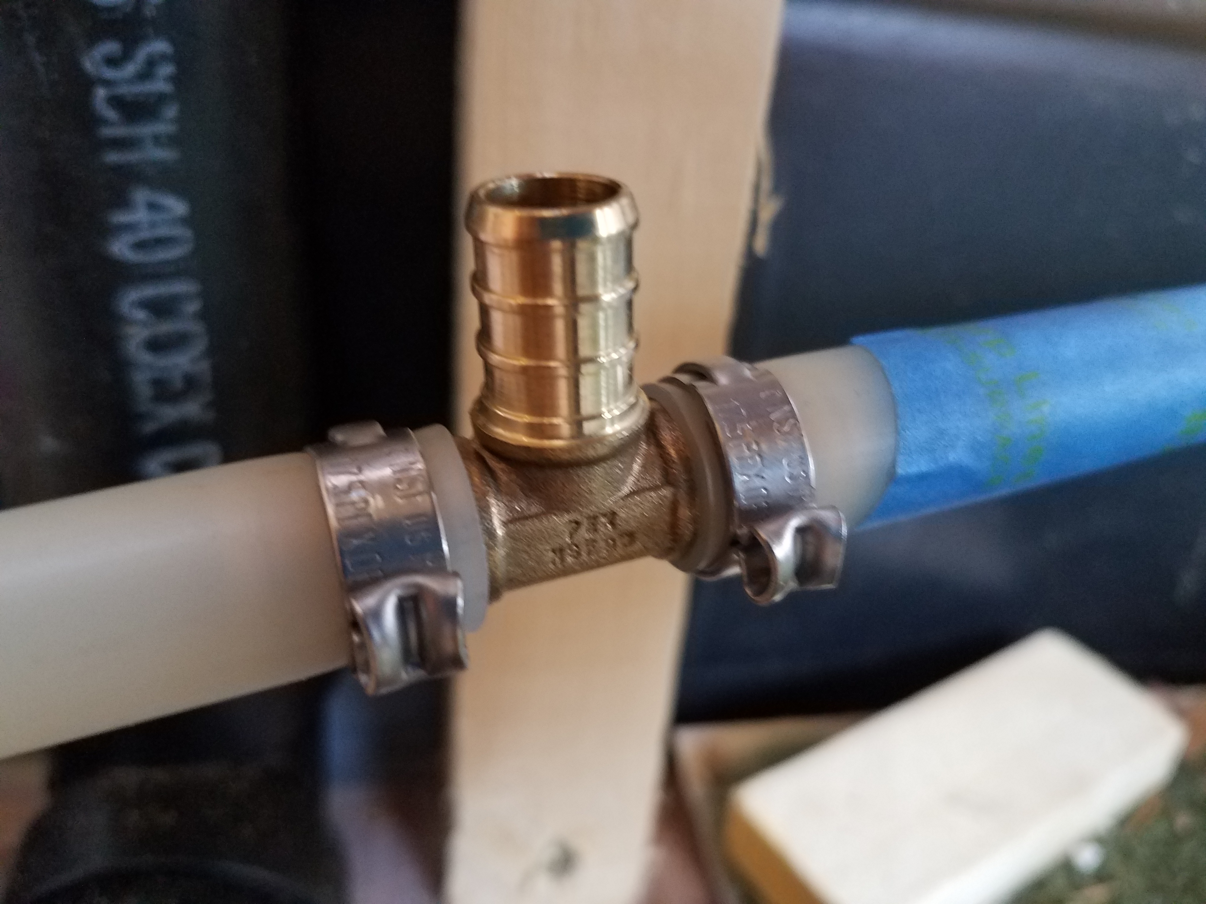 PEX tubing with a copper T fitting